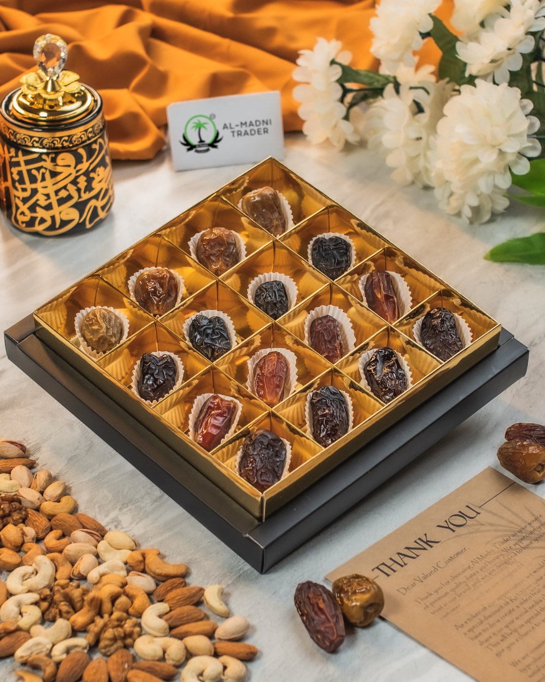 "Premium dates gift basket with Mabroom, Ajwa, Amber, Qalmi, Sughai, and Sukkari dates for a special treat."
