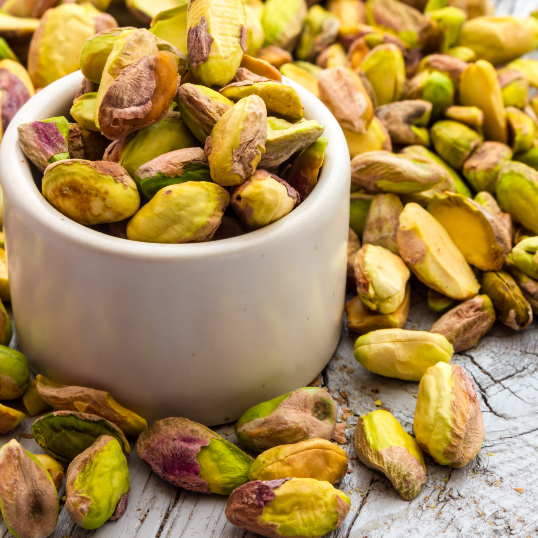 Premium Pistachio (Pista Giri) kernels in vibrant green color from Al Madni Trader.
