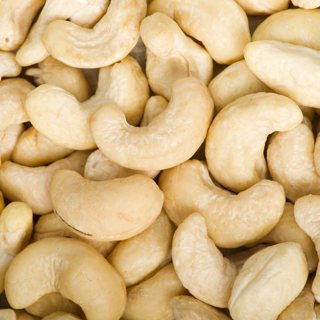 Close-up of whole, plump cashew nuts in natural lighting.