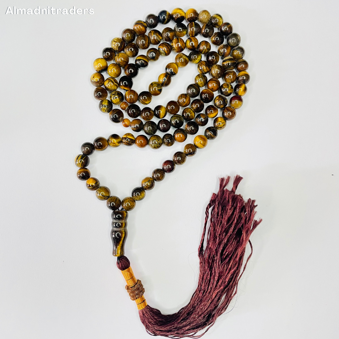 "Tiger Eye Tasbeeh - Spiritual beads with vibrant golden-brown hues"