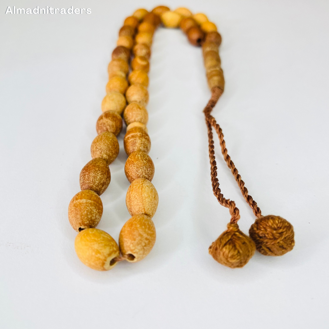 "Close-up of Sandalwood Tasbeeh showing finely crafted beads"