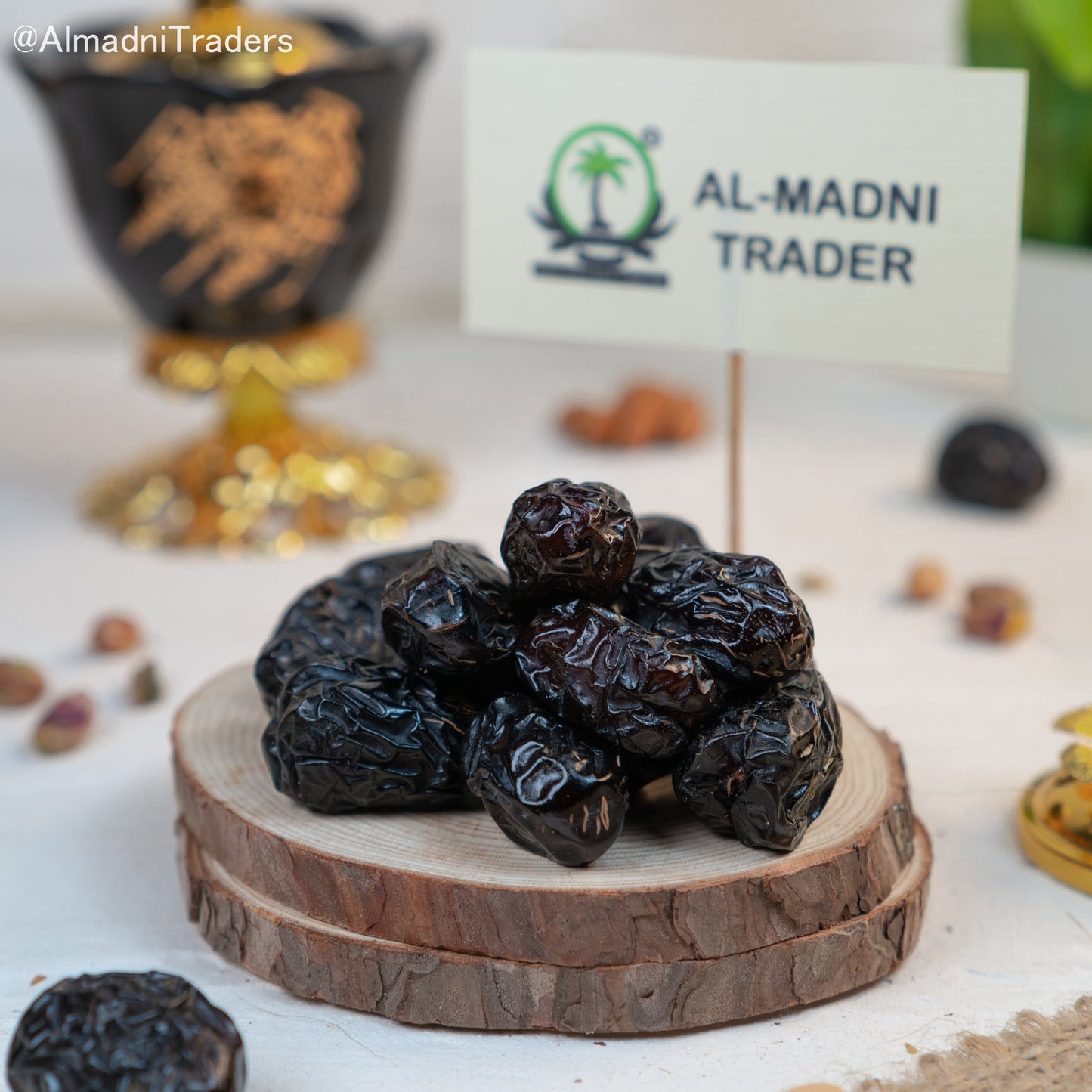 Ajwa Dates Classic spread out on a wooden surface, highlighting their unique texture and classic look