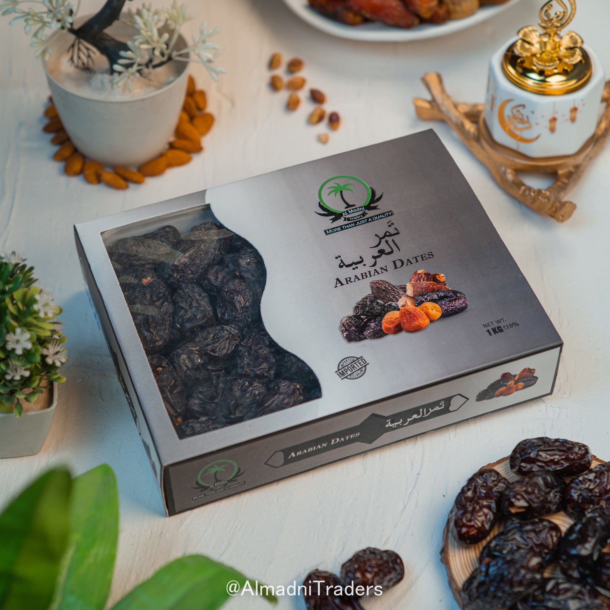 "Package of Qalmi Dates with visible dates inside, illustrating their freshness and texture"